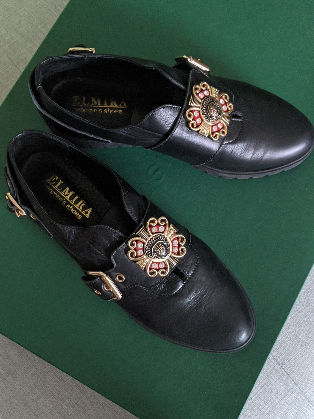 Mika Yoga Wear Black Leather Loafers with Gold and Red Medallion